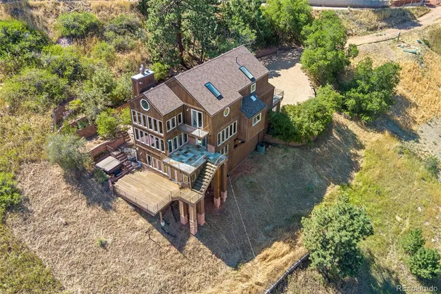 a backyard of a building with trees