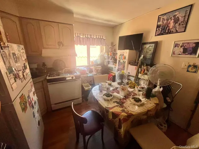 a bathroom with a table and a chair