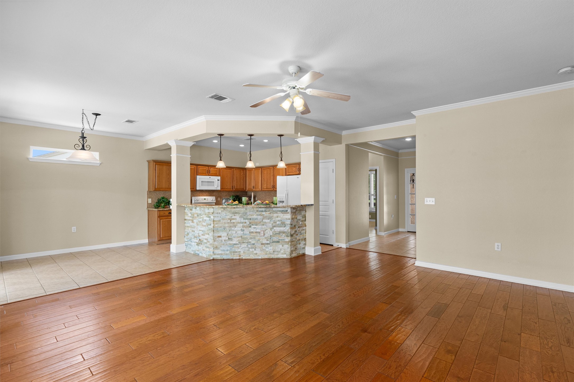 321 Yukon Terrace Georgetown, TX 78633 - Photo 2 of 15 a view of an empty room with wooden floor