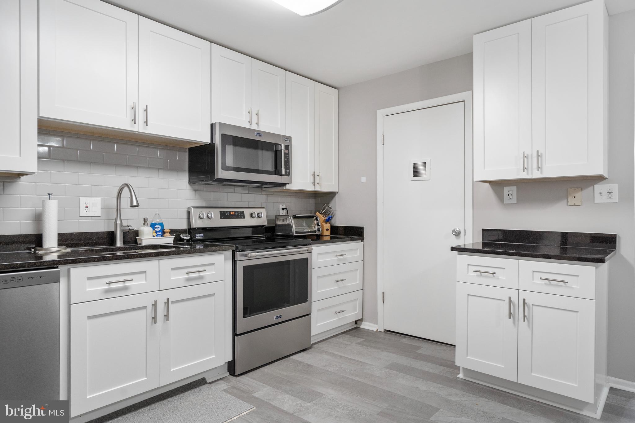 8019 Valley Manor Road, Unit 2B Owings Mills, MD 21117 - Photo 12 of 29 Granite Counters and Stainless Steel Appliances