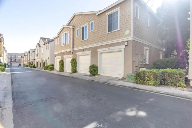 a view of a street with a house