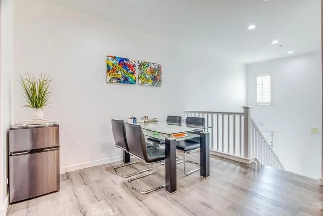 a workspace with furniture and a potted plant