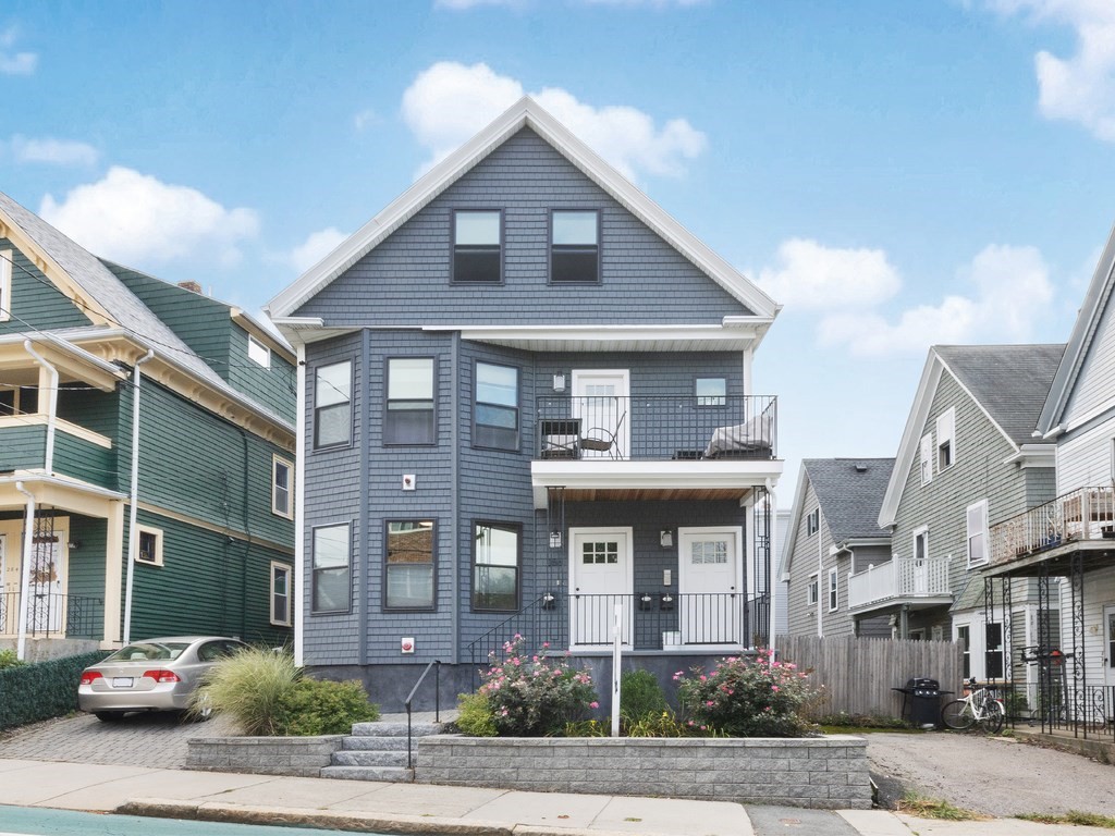 a front view of residential houses