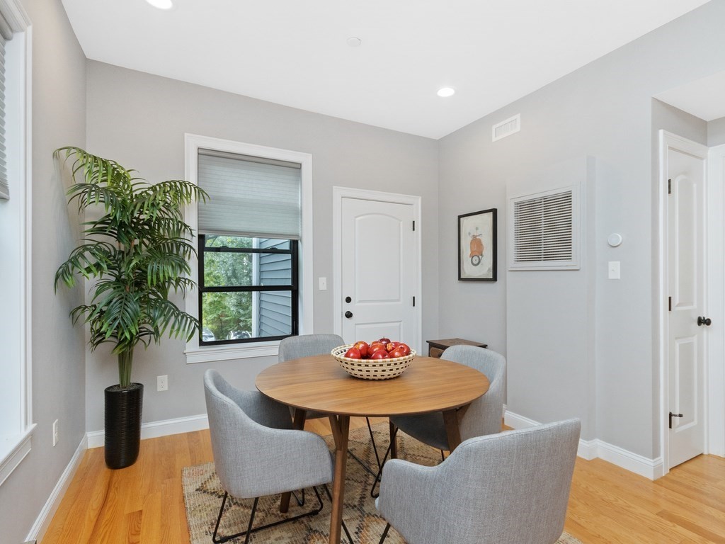 286 Summer Street, Unit 2 Somerville, MA 02144 - Photo 15 of 37 a view of a dining room with furniture and window