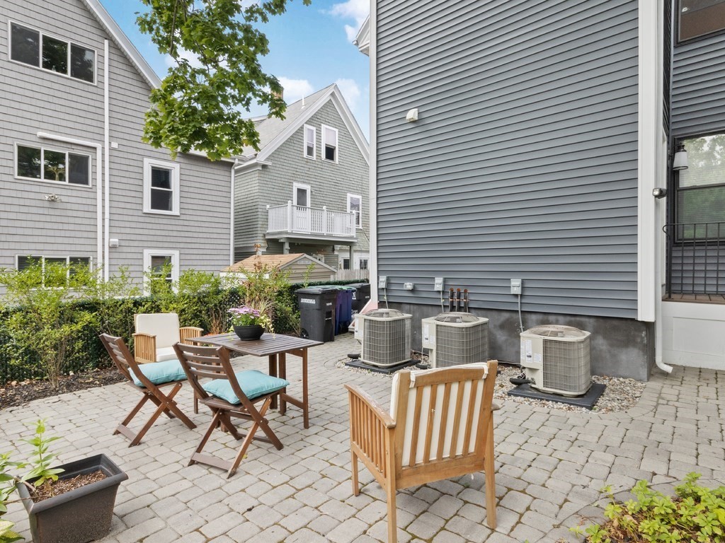 286 Summer Street, Unit 2 Somerville, MA 02144 - Photo 32 of 37 a view of a patio with couple of chairs and potted plants