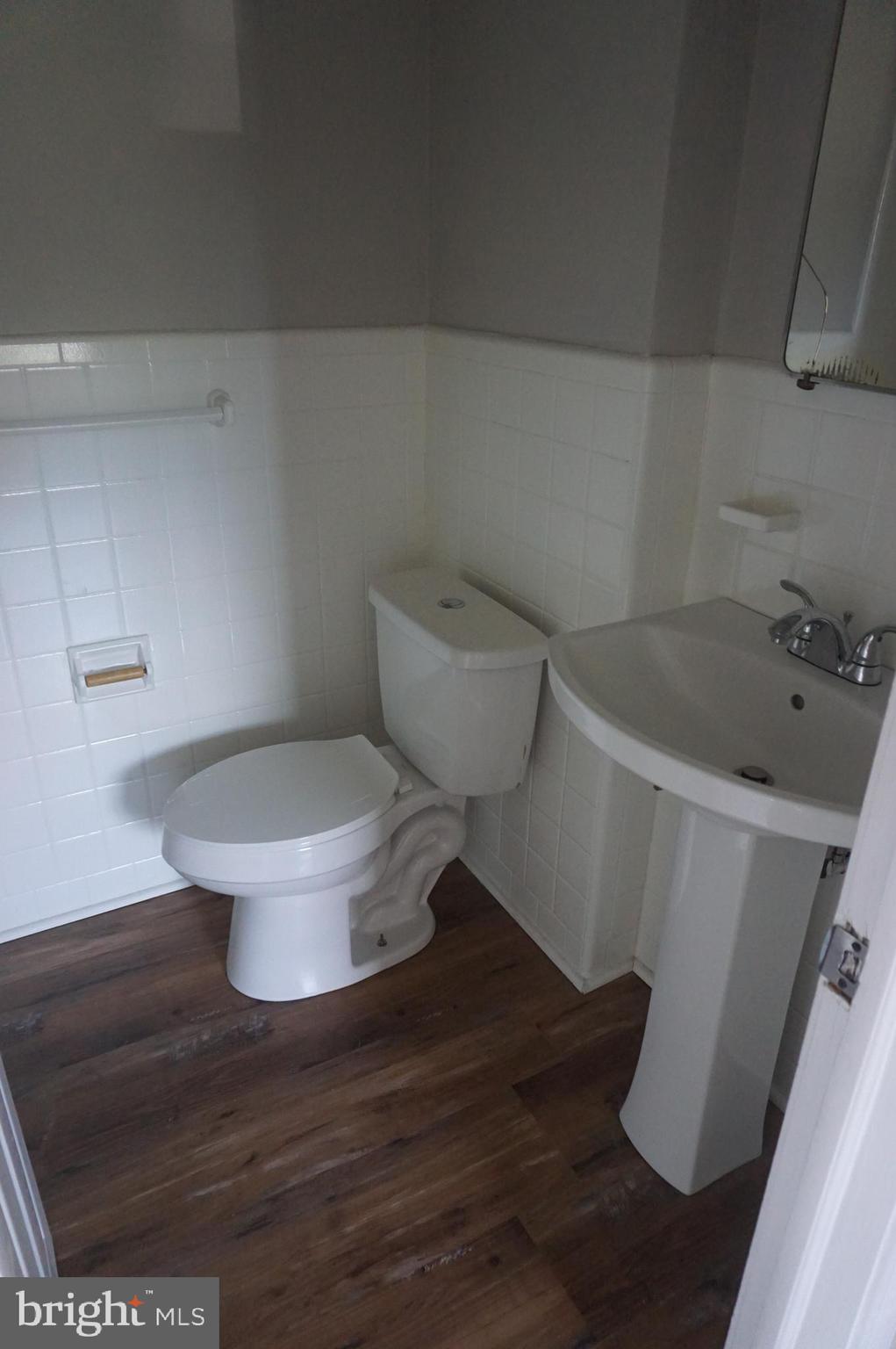 9041 Wesleyan Road Philadelphia, PA 19136 - Photo 24 of 35 a bathroom with a toilet and a sink