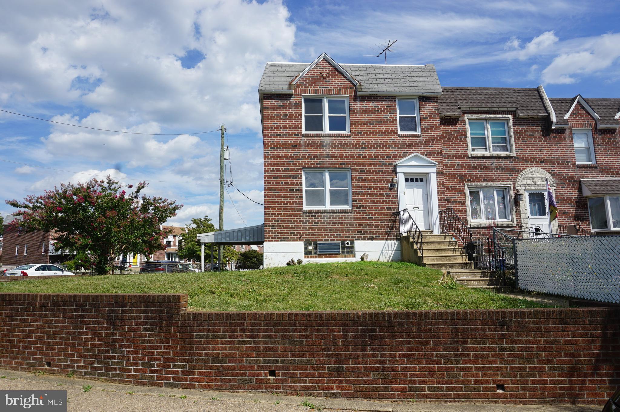 9041 Wesleyan Road Philadelphia, PA 19136 - Photo 3 of 35 a front view of a house with a yard