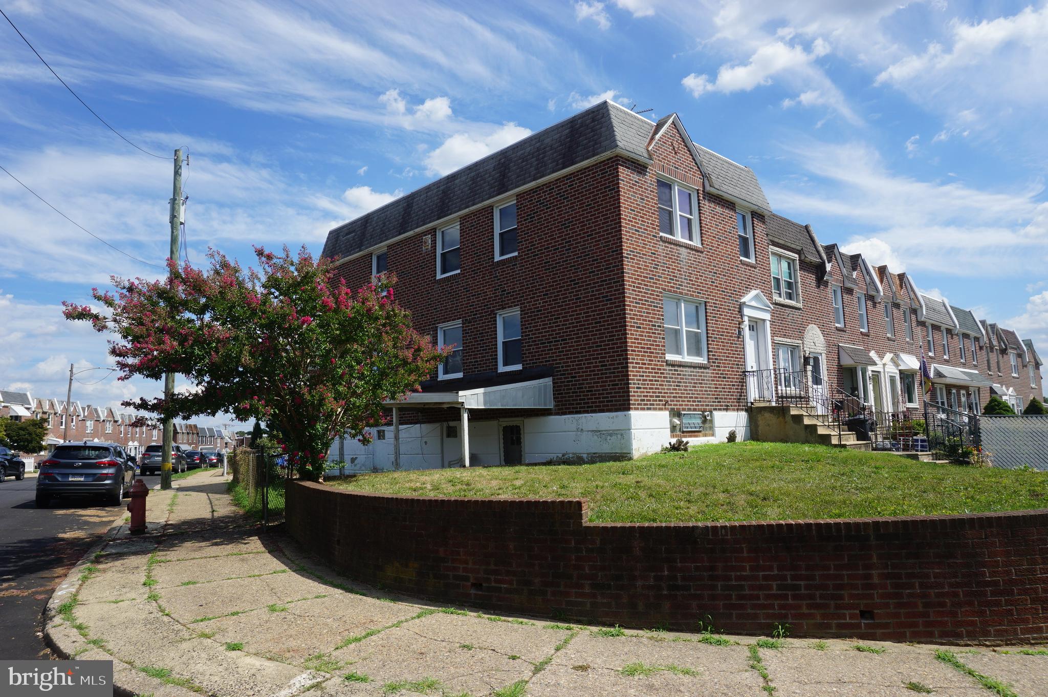 9041 Wesleyan Road Philadelphia, PA 19136 - Photo 35 of 35 a front view of a house with a yard