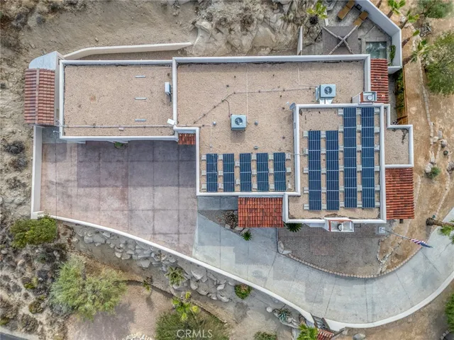 a kitchen with stainless steel appliances granite countertop a sink refrigerator and microwave