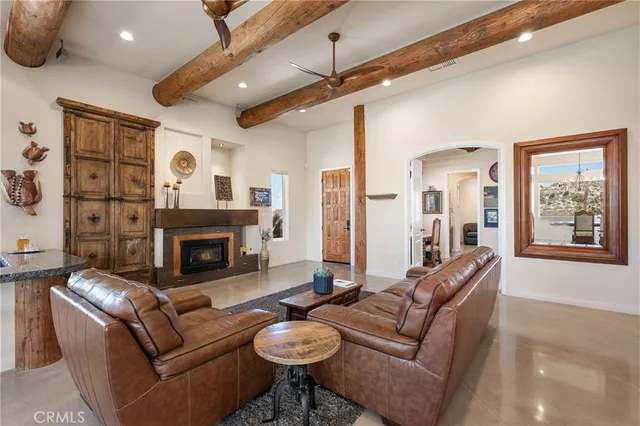 a large en suite bathroom with sink shower and mirror