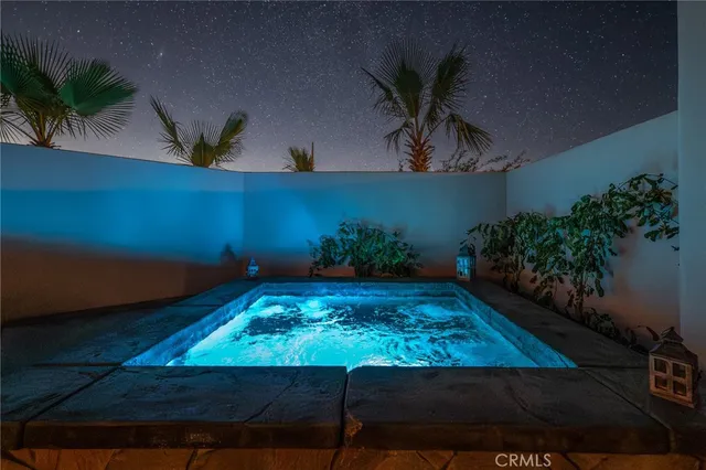 a view of a backyard of the house