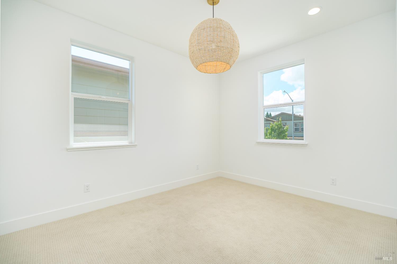 1201 Del Rancho Way Petaluma, CA 94954 - Photo 45 of 56 an empty room with windows and mirror