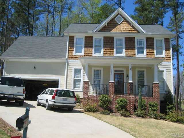 2057 Muirfield Village Way Raleigh, NC 27604 - Photo 1 of 1 Great Curb Appeal, Hardiplank/Ceadar siding, & wrought iron railing.