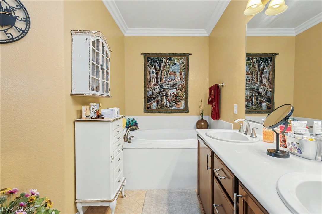 2555 Hampton Road, Unit 3308 Henderson, NV 89052 - Photo 38 of 65 Indulge in relaxation with this inviting bathroom, featuring a deep soaking tub and dual vanity.