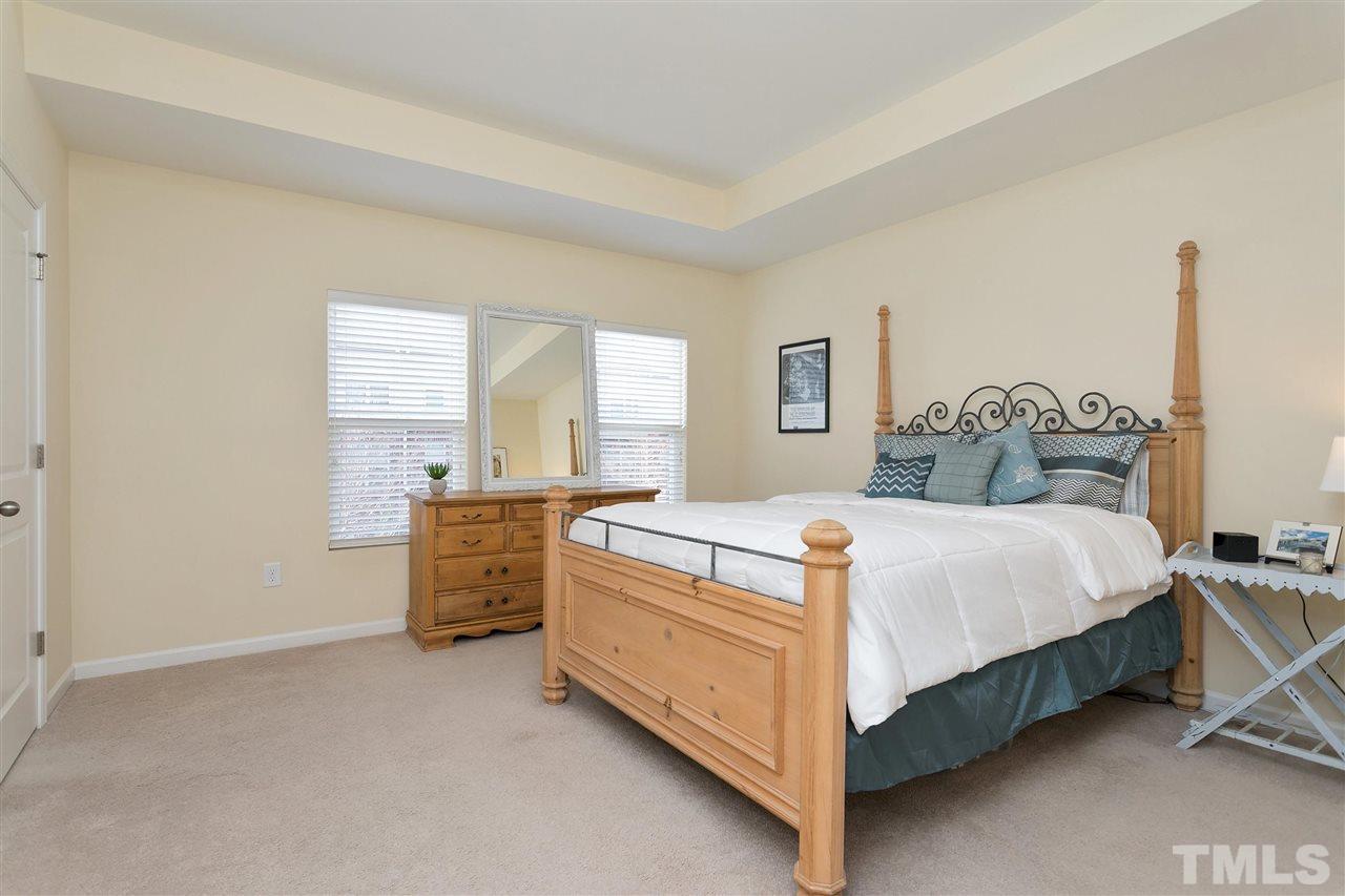 1412 Crafton Way Raleigh, NC 27607 - Photo 13 of 25 a bedroom with a bed and window