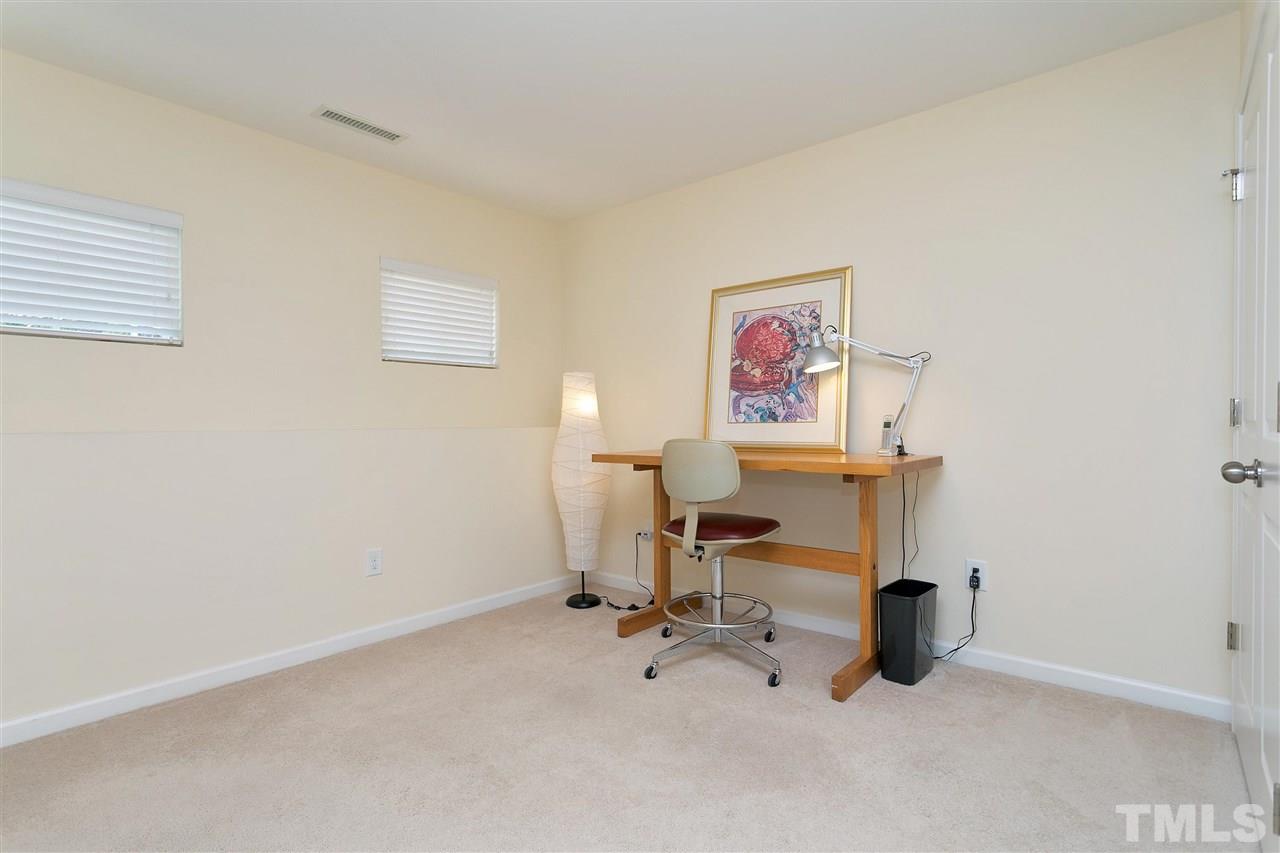 1412 Crafton Way Raleigh, NC 27607 - Photo 20 of 25 a view of a workspace with furniture