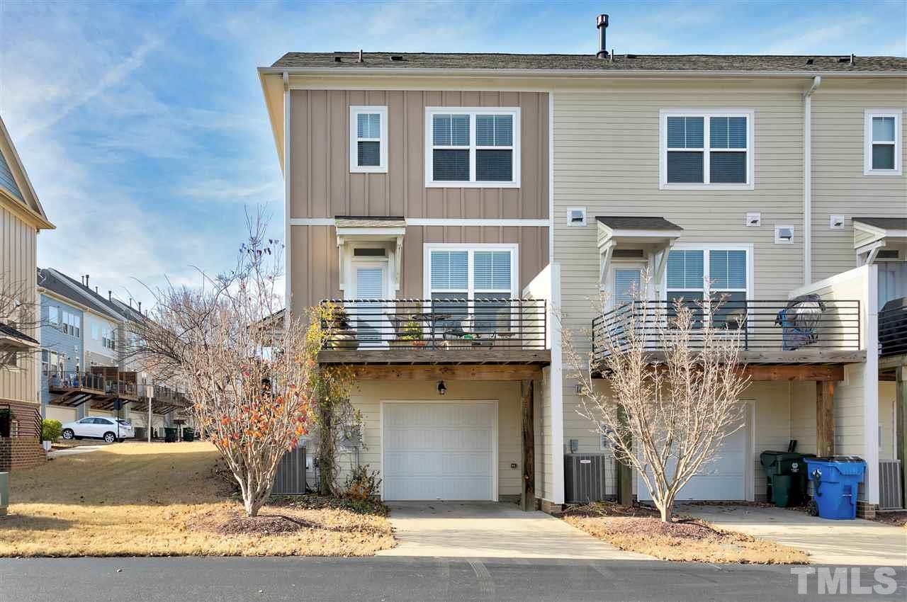 1412 Crafton Way Raleigh, NC 27607 - Photo 23 of 25 a front view of a house with a yard