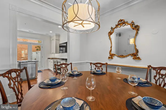 a room with furniture and view kitchen