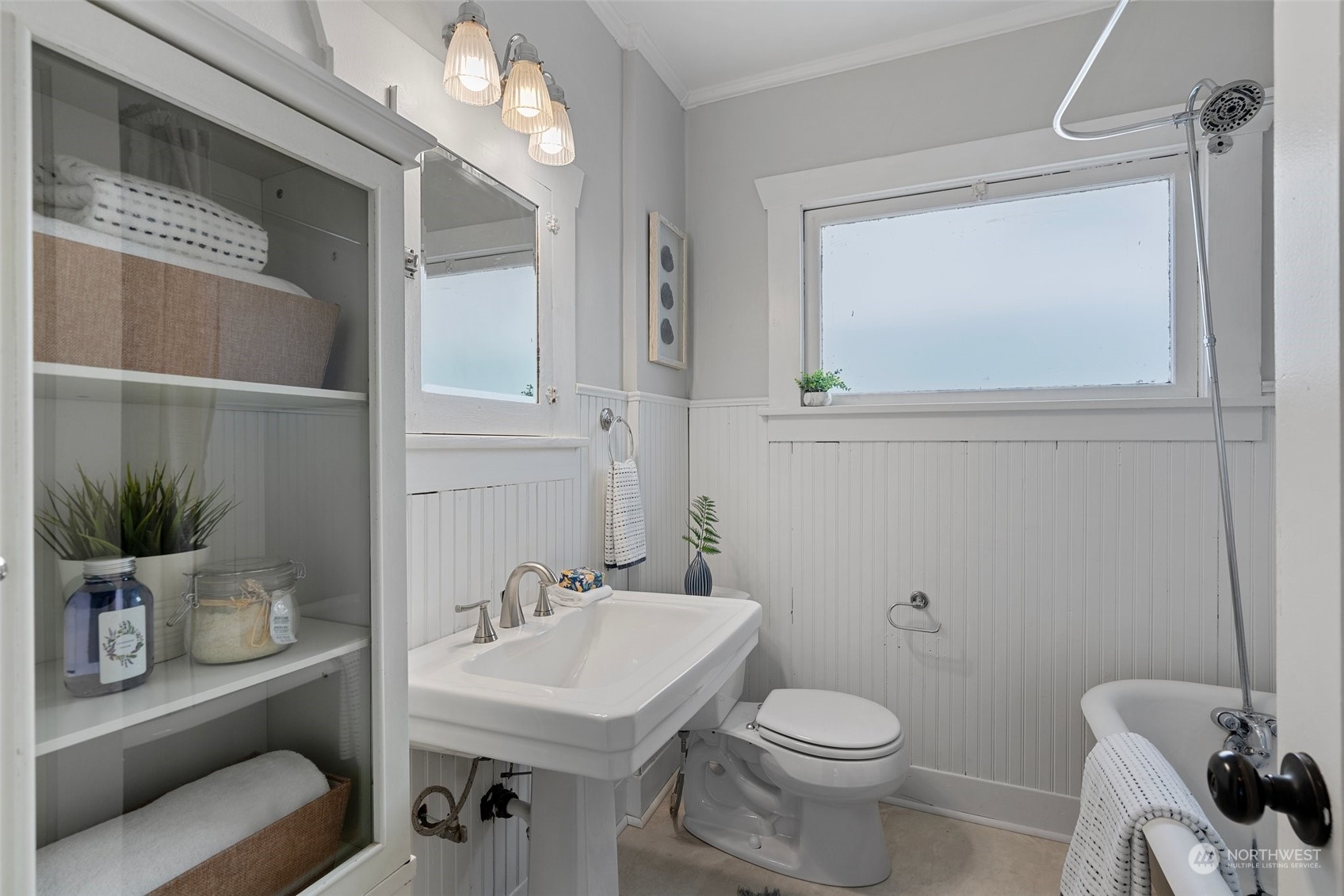 3630 Rockefeller Avenue Everett, WA 98201 - Photo 18 of 30 a bathroom with a toilet a sink and mirror