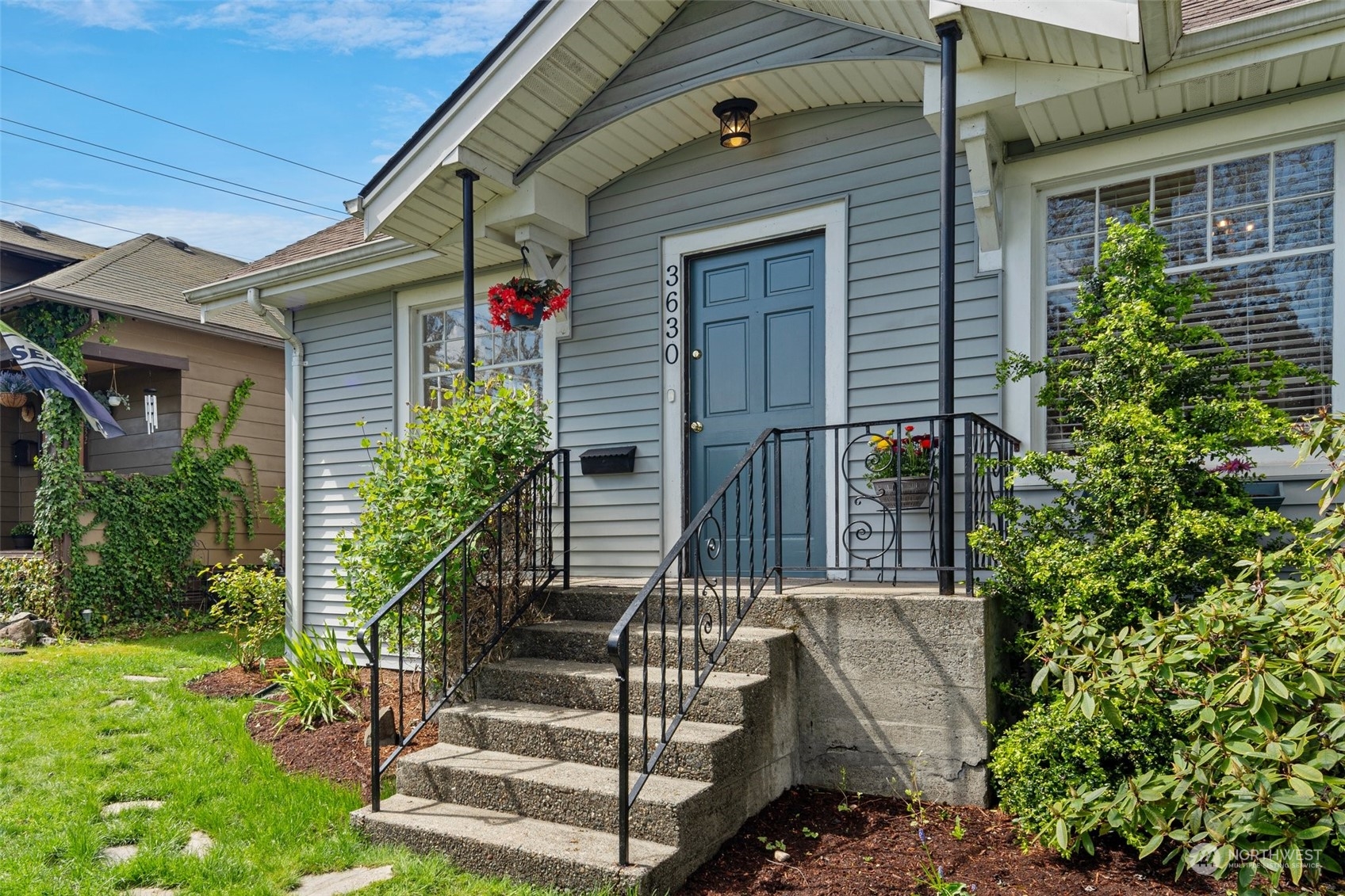 3630 Rockefeller Avenue Everett, WA 98201 - Photo 2 of 30 a view of house with a yard and potted plants