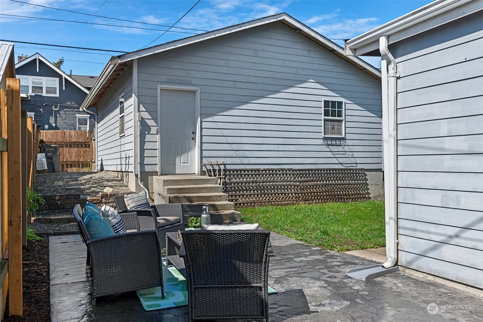 3630 Rockefeller Avenue Everett, WA 98201 - Photo 26 of 30 a backyard of a house with outdoor seating