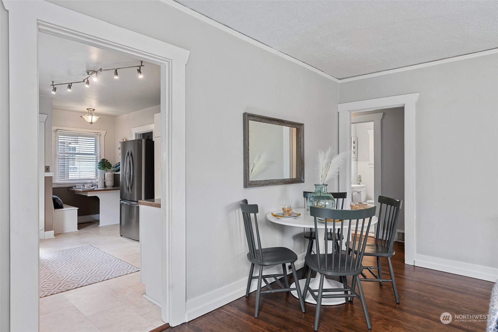 3630 Rockefeller Avenue Everett, WA 98201 - Photo 6 of 30 a view of a dining room with furniture and wooden floor