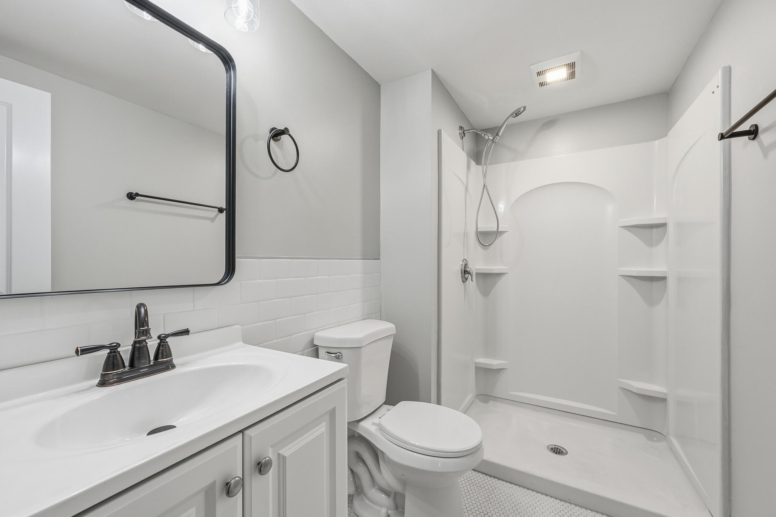 45 Louis Street Hyannis, MA 02601 - Photo 12 of 21 a bathroom with a sink toilet and shower