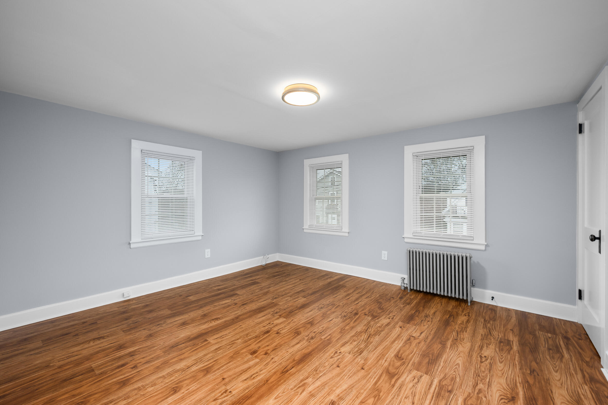 45 Louis Street Hyannis, MA 02601 - Photo 13 of 21 a view of empty room with wooden floor and fan