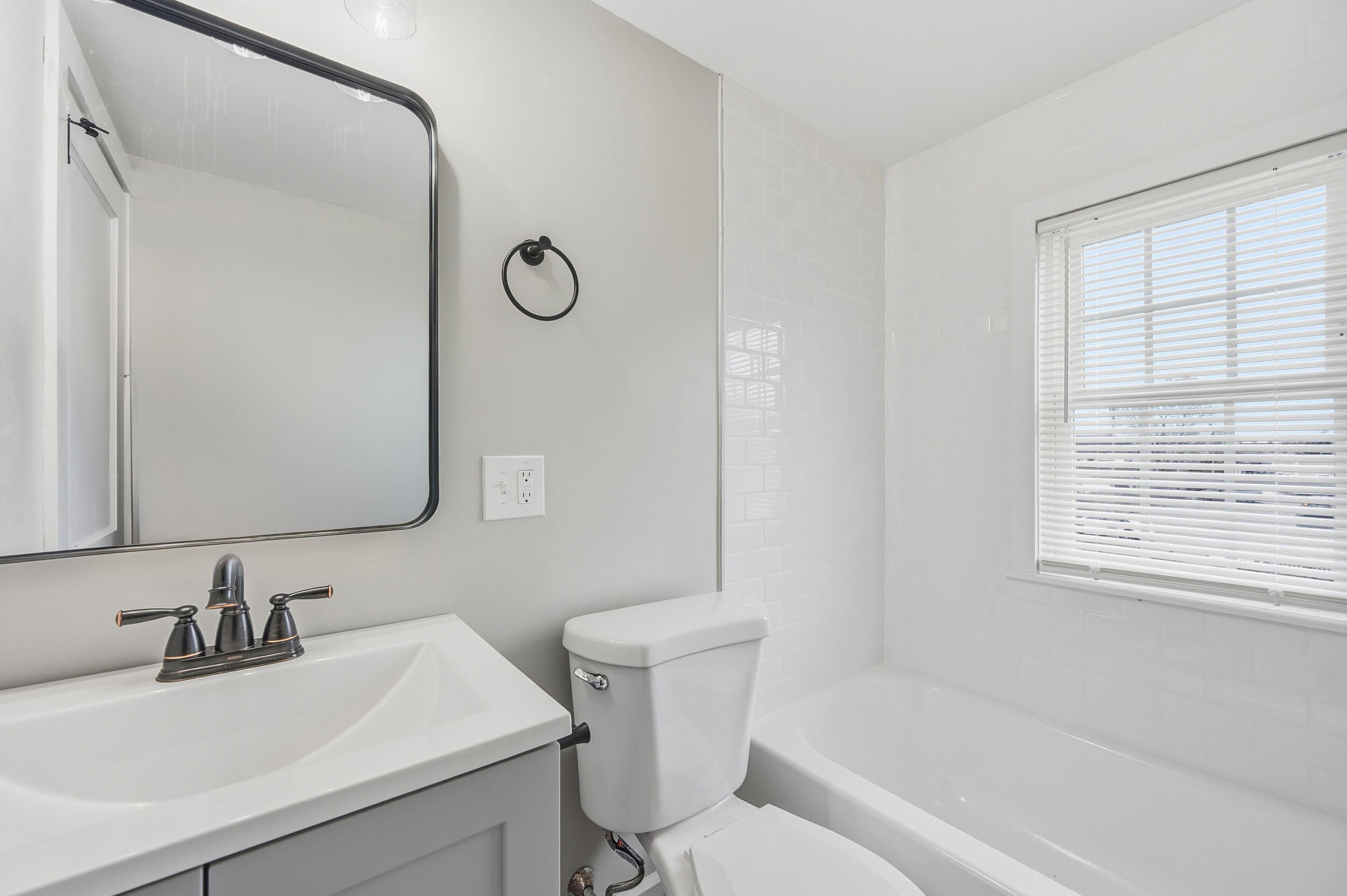 45 Louis Street Hyannis, MA 02601 - Photo 19 of 21 a bathroom with a sink vanity mirror and toilet