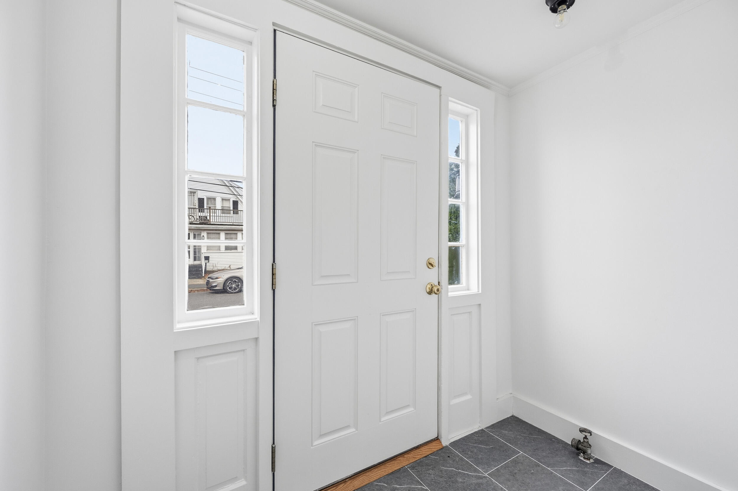 45 Louis Street Hyannis, MA 02601 - Photo 2 of 21 an empty room with windows