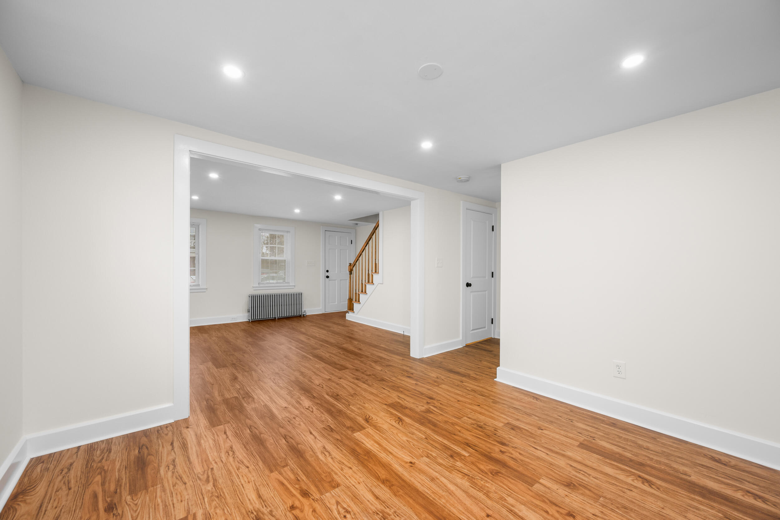 45 Louis Street Hyannis, MA 02601 - Photo 8 of 21 an empty room with wooden floor and windows