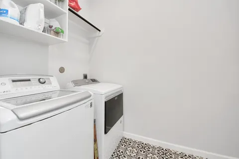 a bedroom with furniture and a book shelf