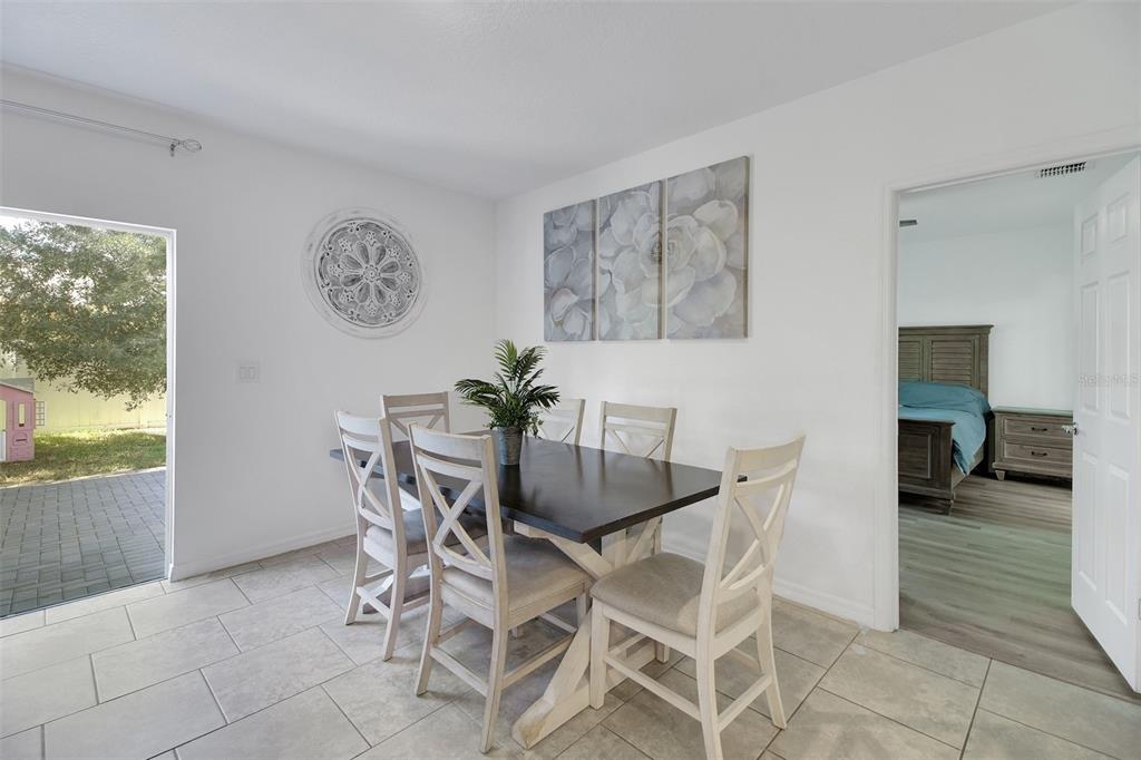 10121 Grande Loop Clermont, FL 34711 - Photo 16 of 30 a dining room with furniture and window