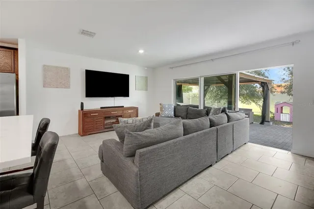 a outdoor space with lots of tables and chairs