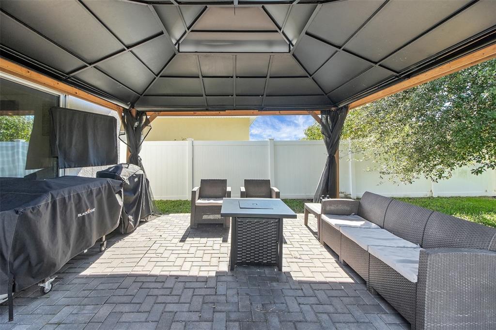 10121 Grande Loop Clermont, FL 34711 - Photo 18 of 30 a outdoor space with lots of tables and chairs