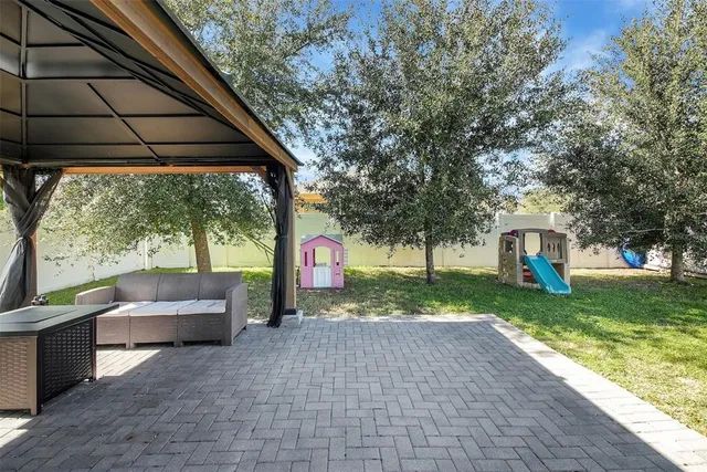 a view of garage with wooden floor and chair