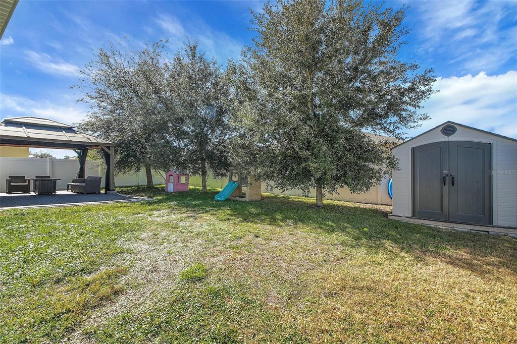 10121 Grande Loop Clermont, FL 34711 - Photo 22 of 30 a view of a back yard