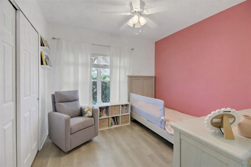 10121 Grande Loop Clermont, FL 34711 - Photo 25 of 30 a living room with furniture and a window