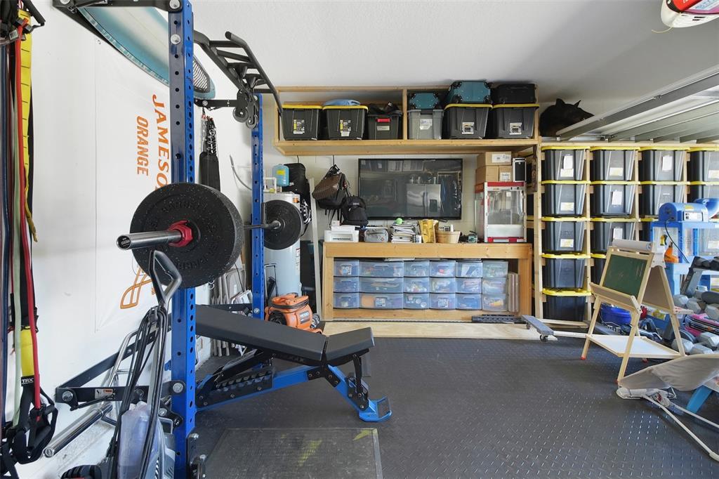 10121 Grande Loop Clermont, FL 34711 - Photo 28 of 30 a living room with furniture and a flat screen tv