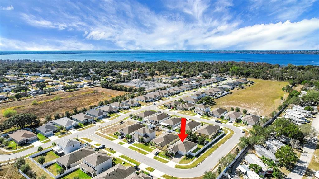 10121 Grande Loop Clermont, FL 34711 - Photo 3 of 30 an aerial view of residential houses with outdoor space