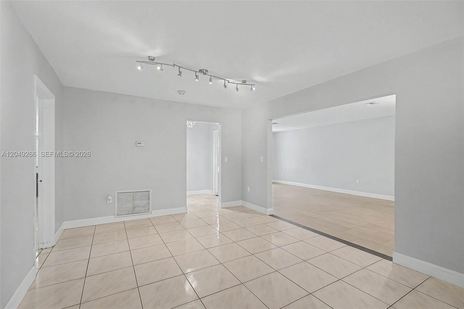 11860 Southwest 81st Road, Unit 11860 Pinecrest, FL 33156 - Photo 7 of 24 Dining/Living/Family
