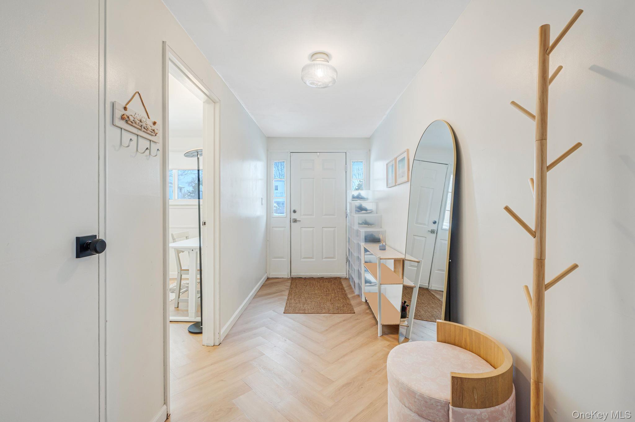 7 Seneca Drive Commack, NY 11725 - Photo 4 of 40 Foyer entrance with healthy amount of natural light