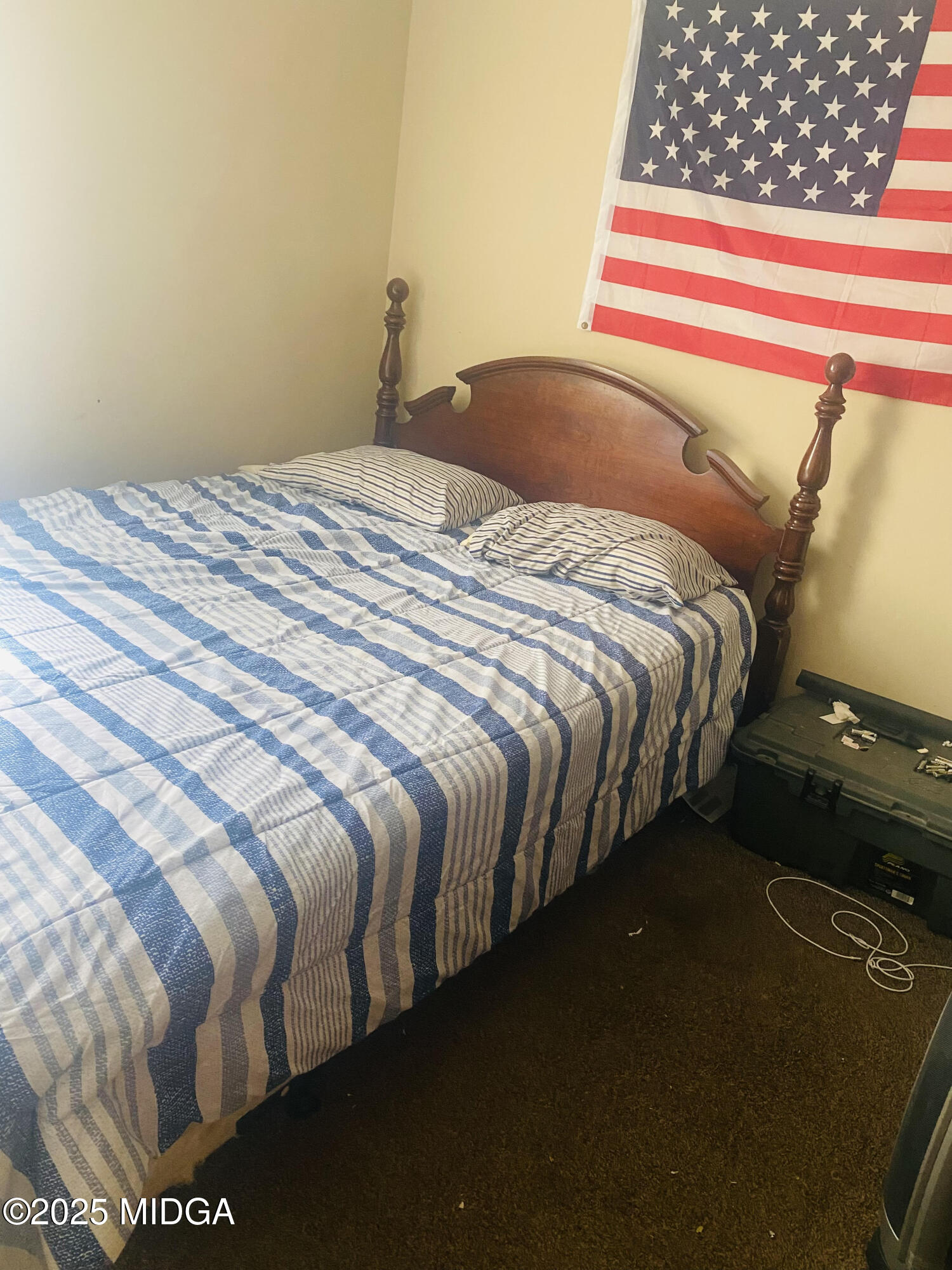 4496 Thrasher Circle Macon, GA 31206 - Photo 4 of 6 a bedroom with a bed and a window