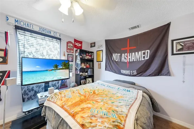 a room with furniture and a flat screen tv