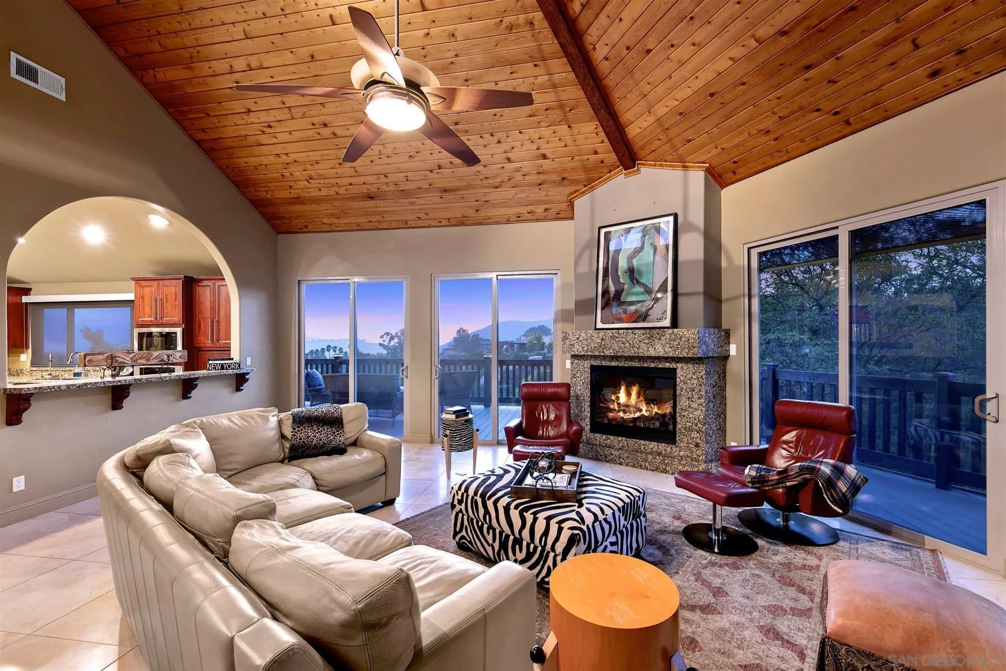 3480 Hidden Trail Drive Jamul, CA 91935 - Photo 17 of 38 a living room with furniture and a fireplace