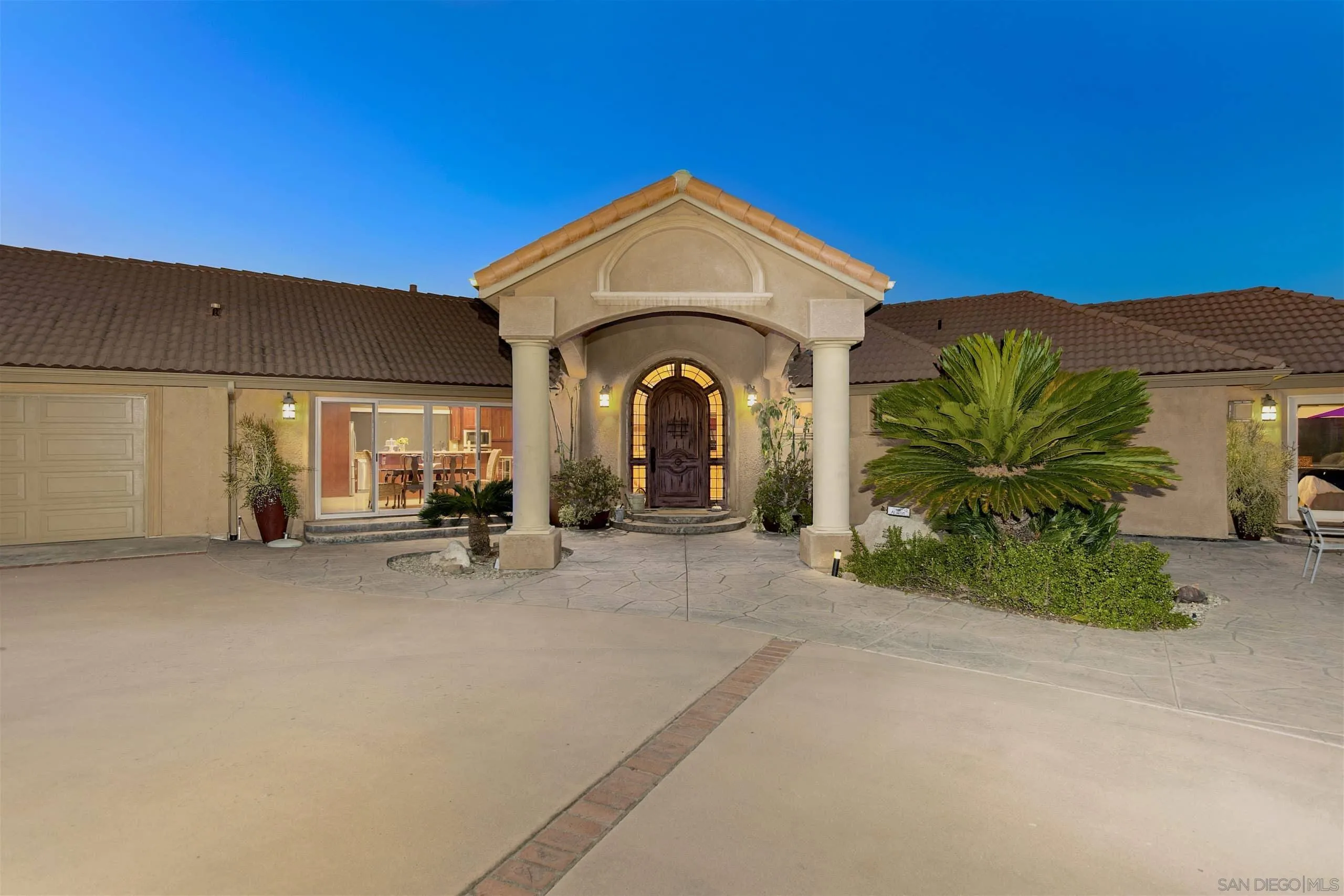 3480 Hidden Trail Drive Jamul, CA 91935 - Photo 2 of 38 a view of a house with a garden