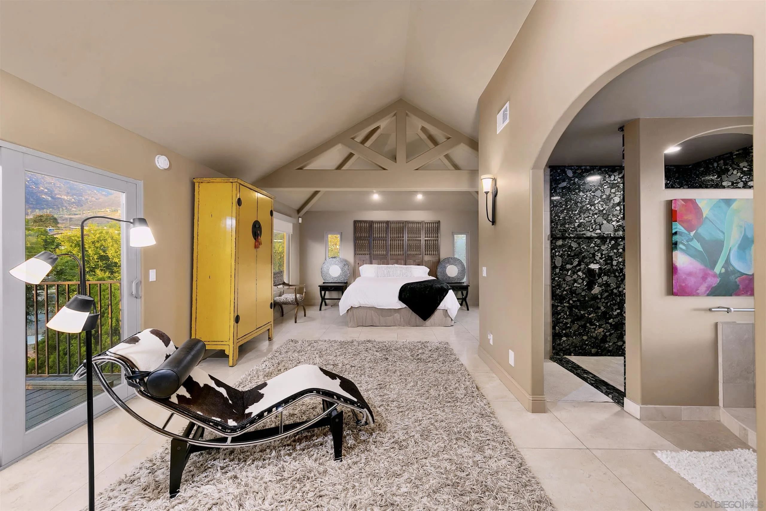 3480 Hidden Trail Drive Jamul, CA 91935 - Photo 23 of 38 a living room with furniture rug and wall painting