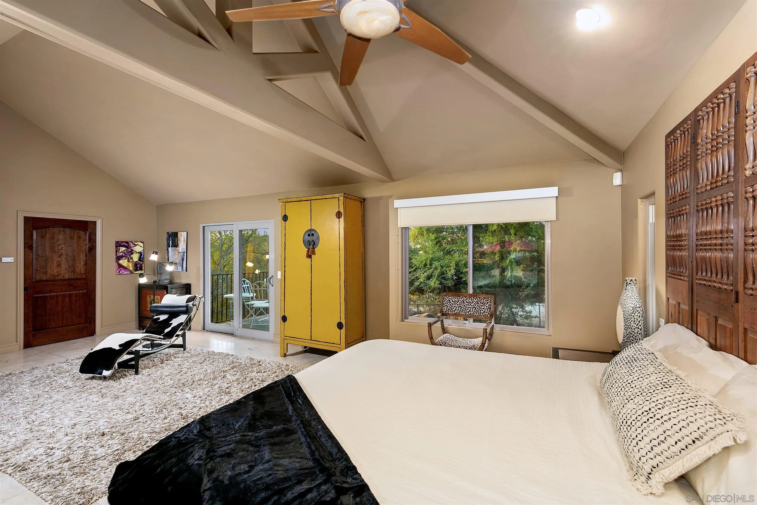 3480 Hidden Trail Drive Jamul, CA 91935 - Photo 26 of 38 a bed sitting in a spacious bedroom next to a window