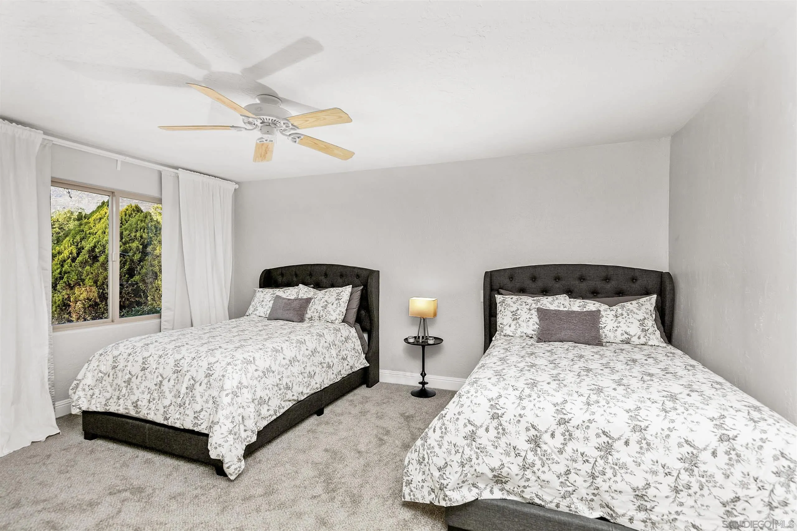 3480 Hidden Trail Drive Jamul, CA 91935 - Photo 38 of 38 a bedroom with a bed and wooden floor