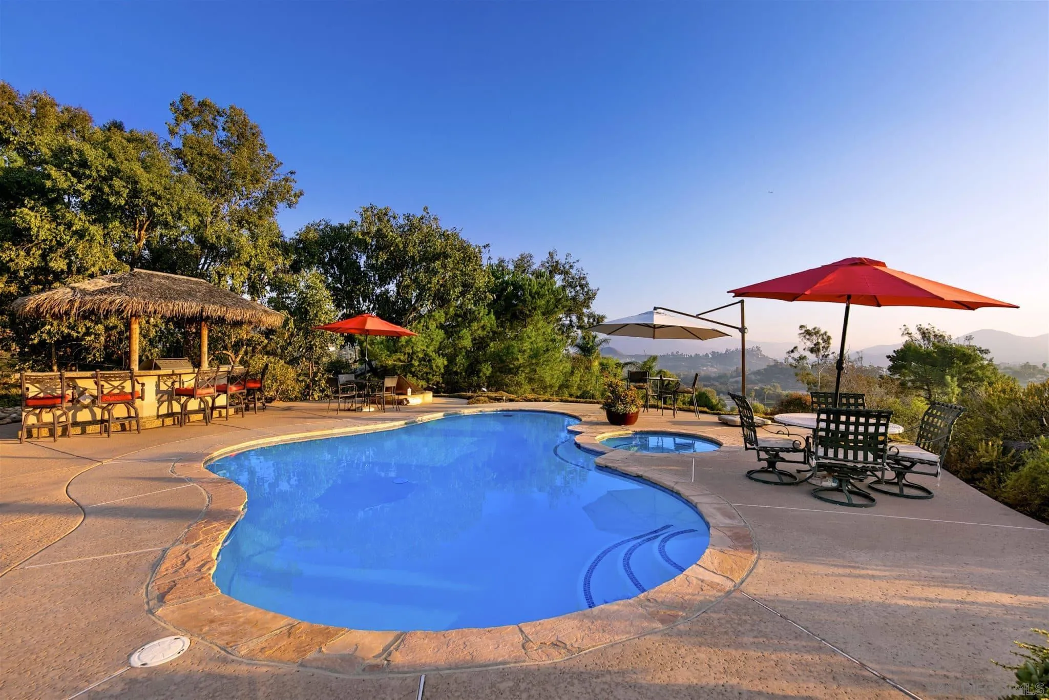 3480 Hidden Trail Drive Jamul, CA 91935 - Photo 7 of 38 a view of a swimming pool with a patio